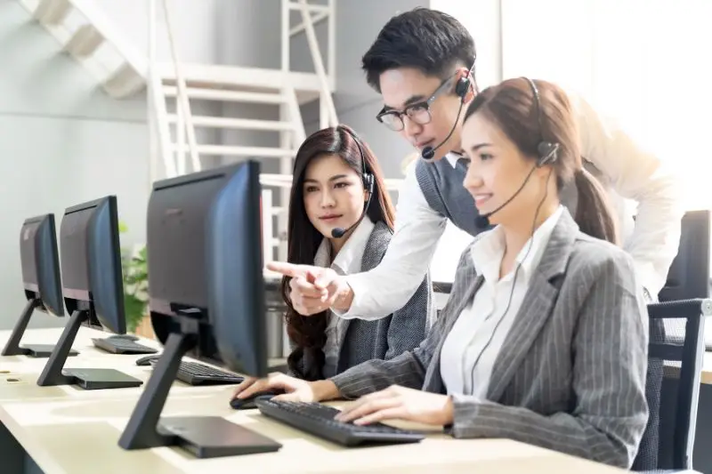 Answering Service Employee With Supervisor
